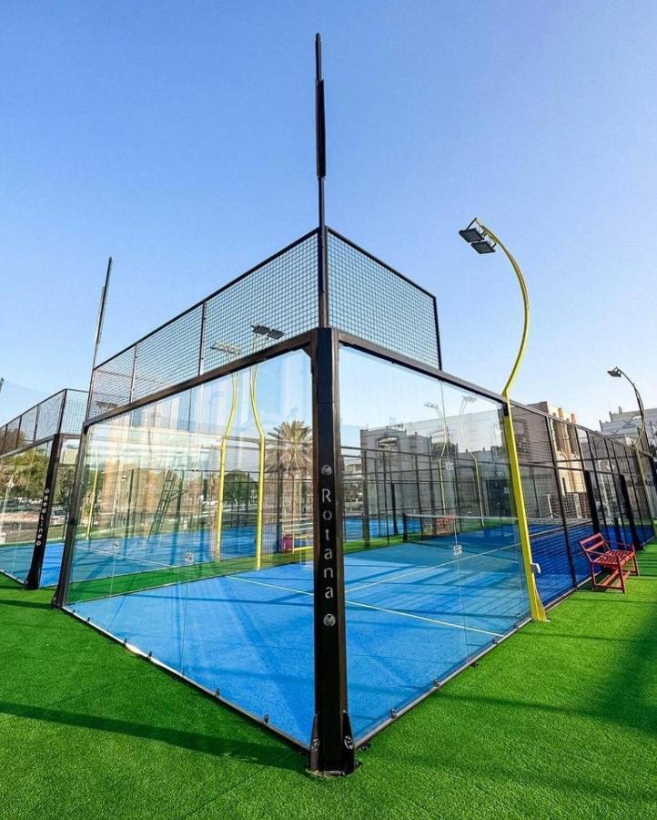 Hotel Al Ain Rotana Exterior foto A paddle tennis court